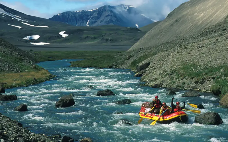 A lone raft floats the Aniakchak Wild River as it flows through the "Gates"