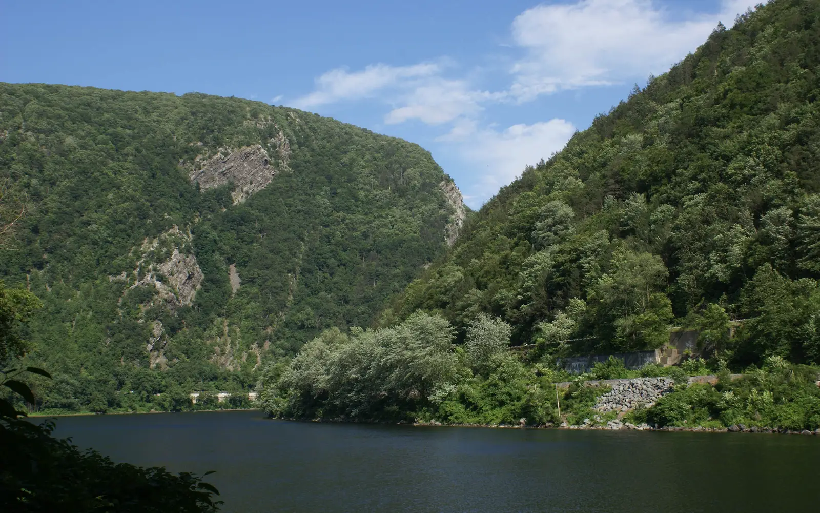 View of the Delaware River cutting between two low mountain peaks
