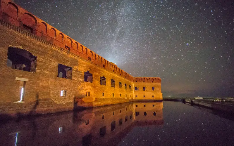 A few of the stars at night with a view of Fort Jefferson.