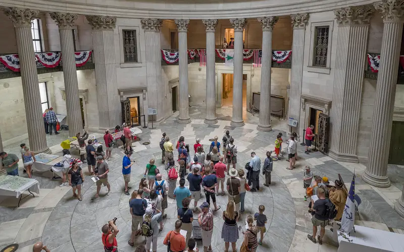 “Large crowd inside the rotunda of Federal Hall National Memorial”