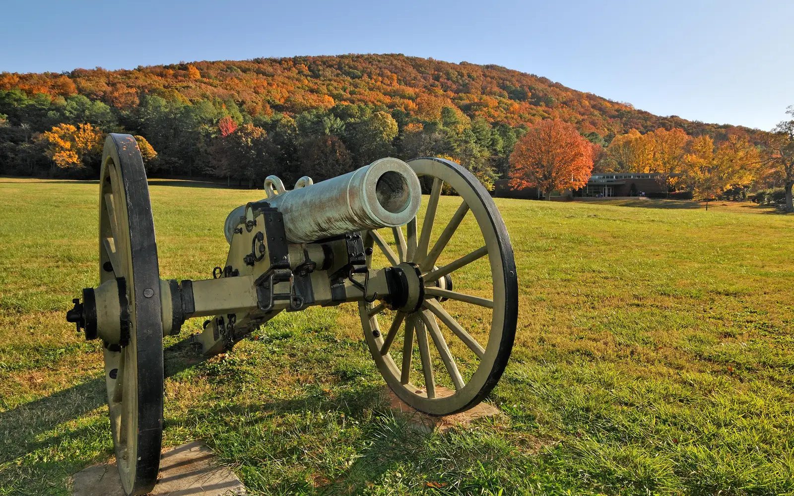 Cannon with front field and Visitor Center in background.